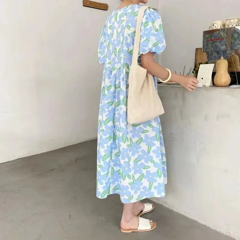 Amelita – Kleid mit Blumenmuster und Puffärmeln